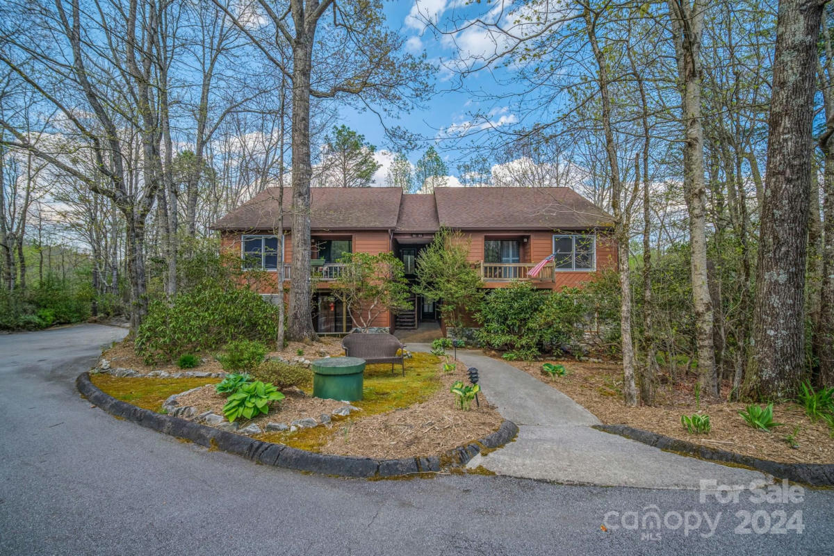 43 TOXAWAY VIEWS DR UNIT 104, LAKE TOXAWAY, NC 28747, photo 1 of 42